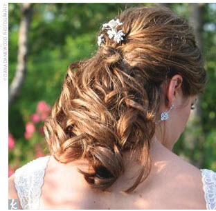 brides hair with diamante clip and curls