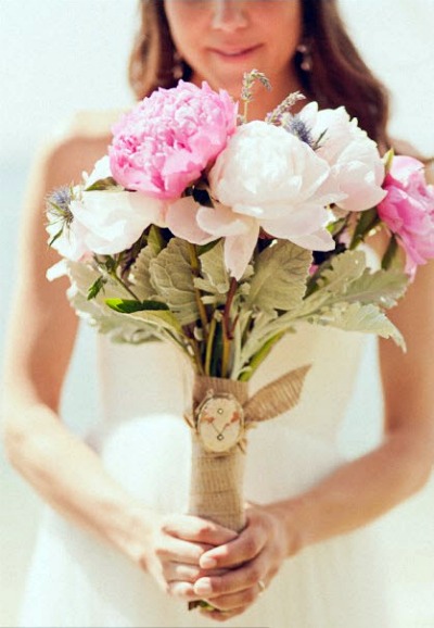 bride with pink peony bouquet