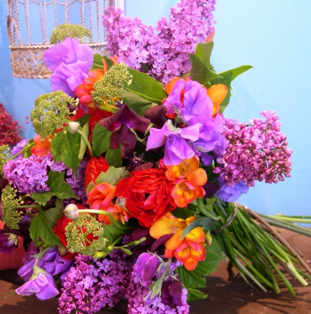 bright wedding flowers purple, orange and scarlet wedding bouquet