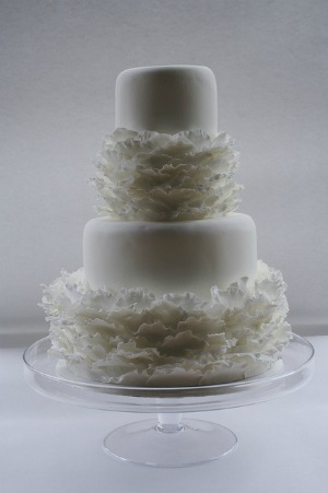 tiered wedding cake with ruffles