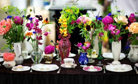 wedding flowers in mismatched vases