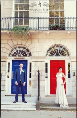bride and groom outside town house