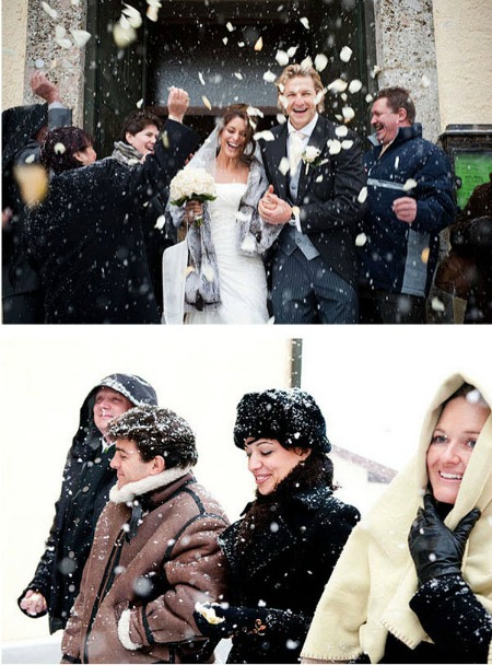 bride and groom leave church in snow