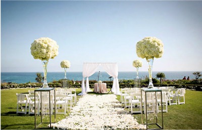 petal strewn wedding aisle