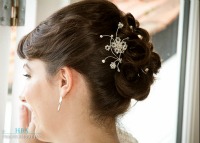 bride with updo with diamante pin