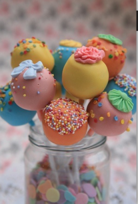 yellow, pink and blue cake pops