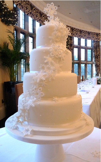 white snowflake tiered wedding cake