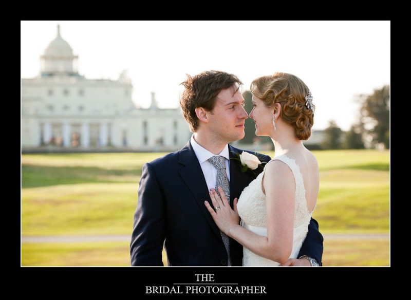 Bride and groom outside Stoke Park Club
