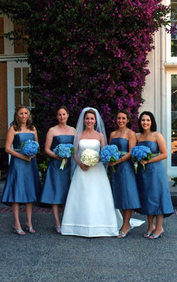 bridesmaids with blue wedding flowers