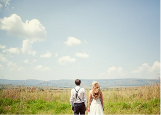 couple in countryside at wedding 