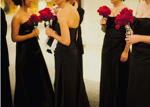 Bridesmaids in black dresses at January wedding