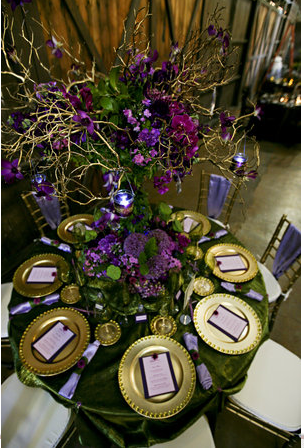 Purple and gold themed wedding table 