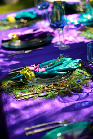 Peacock wedding theme table setting 