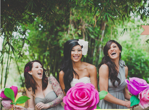 bridesmaids with giant paper flowers