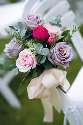 purple and pink rose tied bouquet 