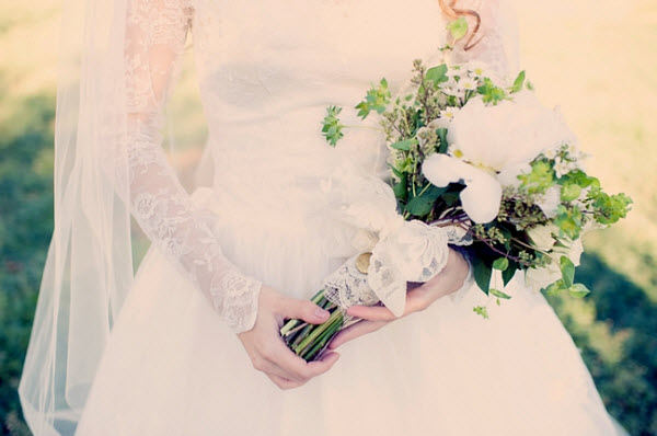 vintage wedding dress and bouquet