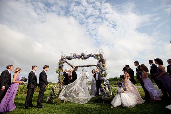 bridesmaids and bestmen at outdoor wedding