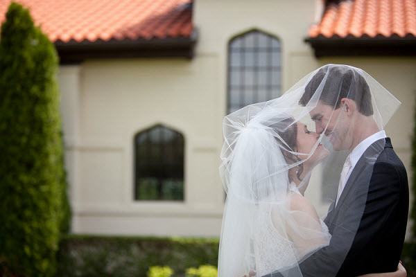 bride and groom smiling