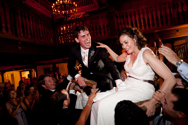 jewish bride and groom on chairs