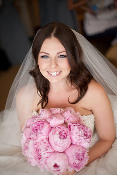Blushing bride and her pink bouquet