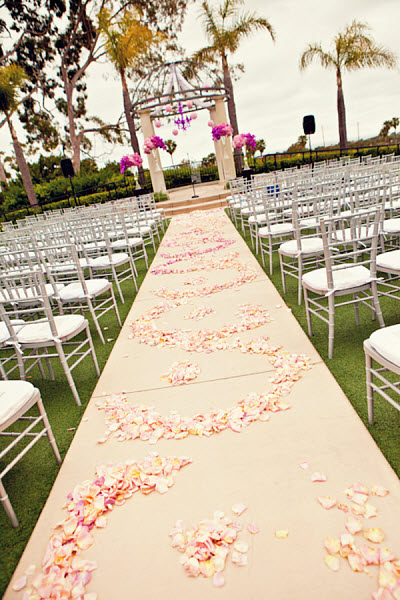 wedding aisle with pink petals