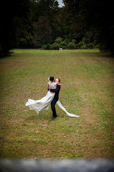 bride and groom dancing outdoors