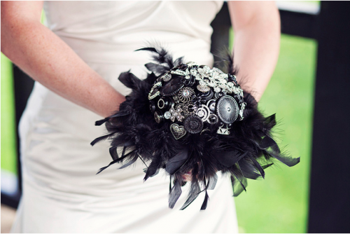 button bouquet with black feathers
