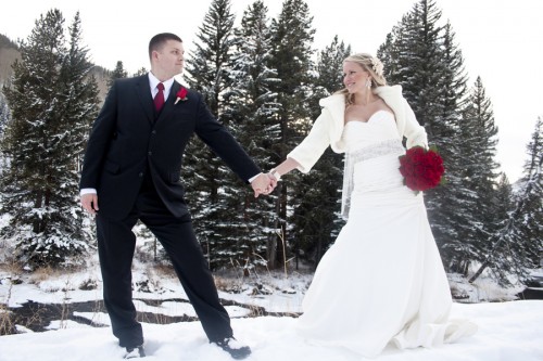 bride and groom in snow 