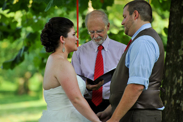 bride and groom saying vows