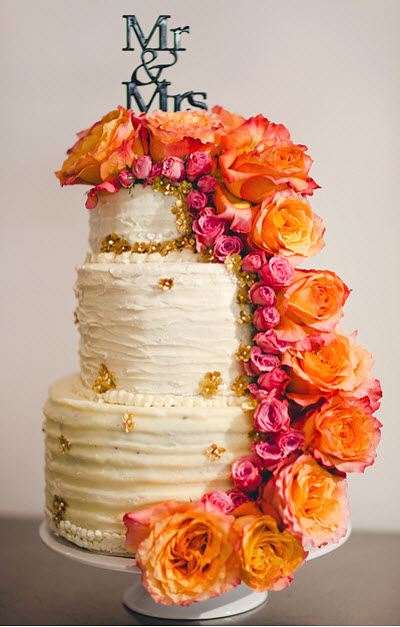 orange and pink wedding cake