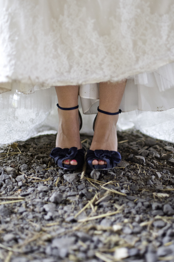 bride in navy shoes