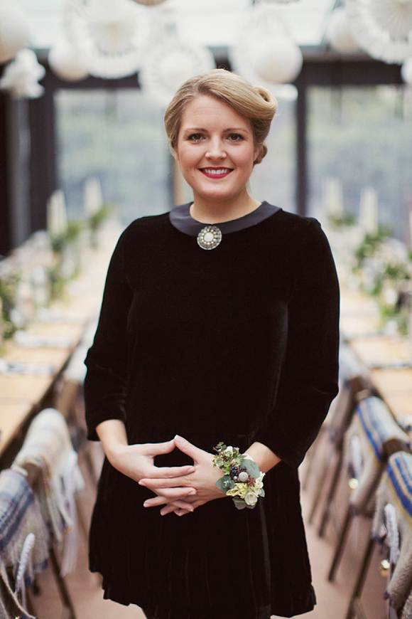 Bridesmaid in black velvet dress with Peter Pan collar 