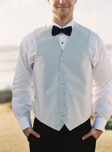 bridegroom in grey waistcoat with black tie 