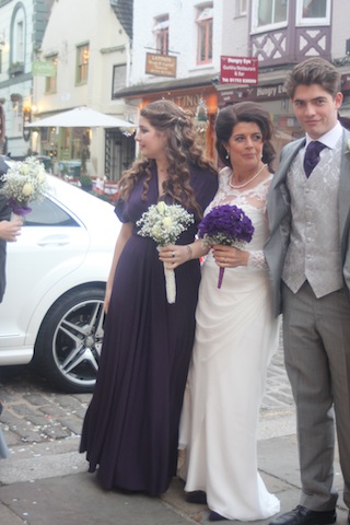 bride with bridesmaid and best man