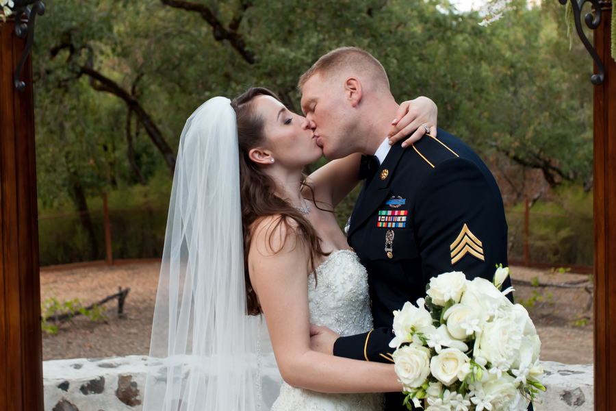 groom kissing bride