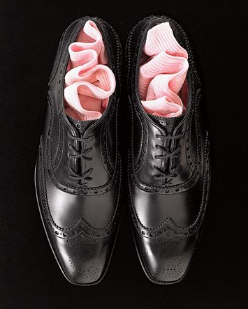 Black and pale pink wedding for the groom