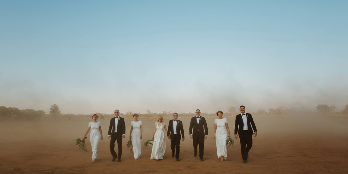 Wedding Photo Goes Viral 24 Hours After Photographer Promises to Donate $3 for Every Share