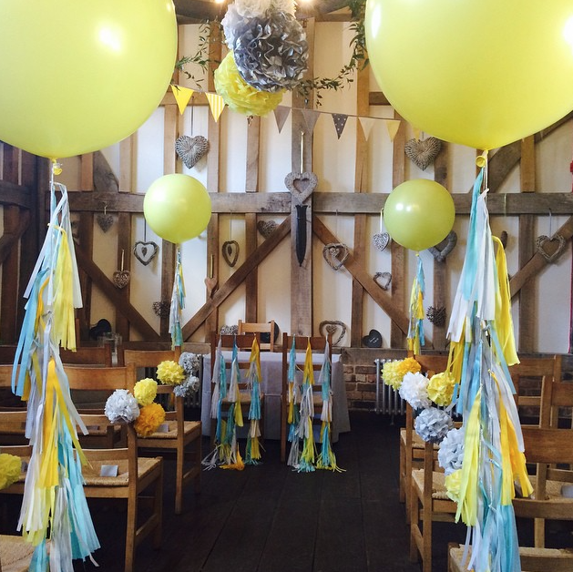 Yellow and blue wedding venue by Bubblegum Balloons